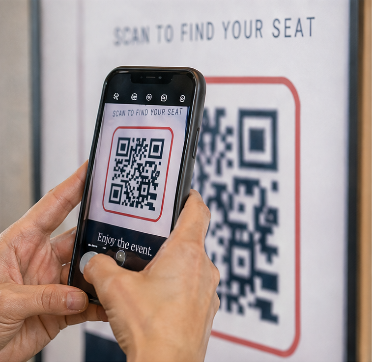 Guest scanning QR code at event entrance